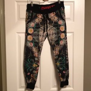 Johnny was printed jogger sweats. Size small.